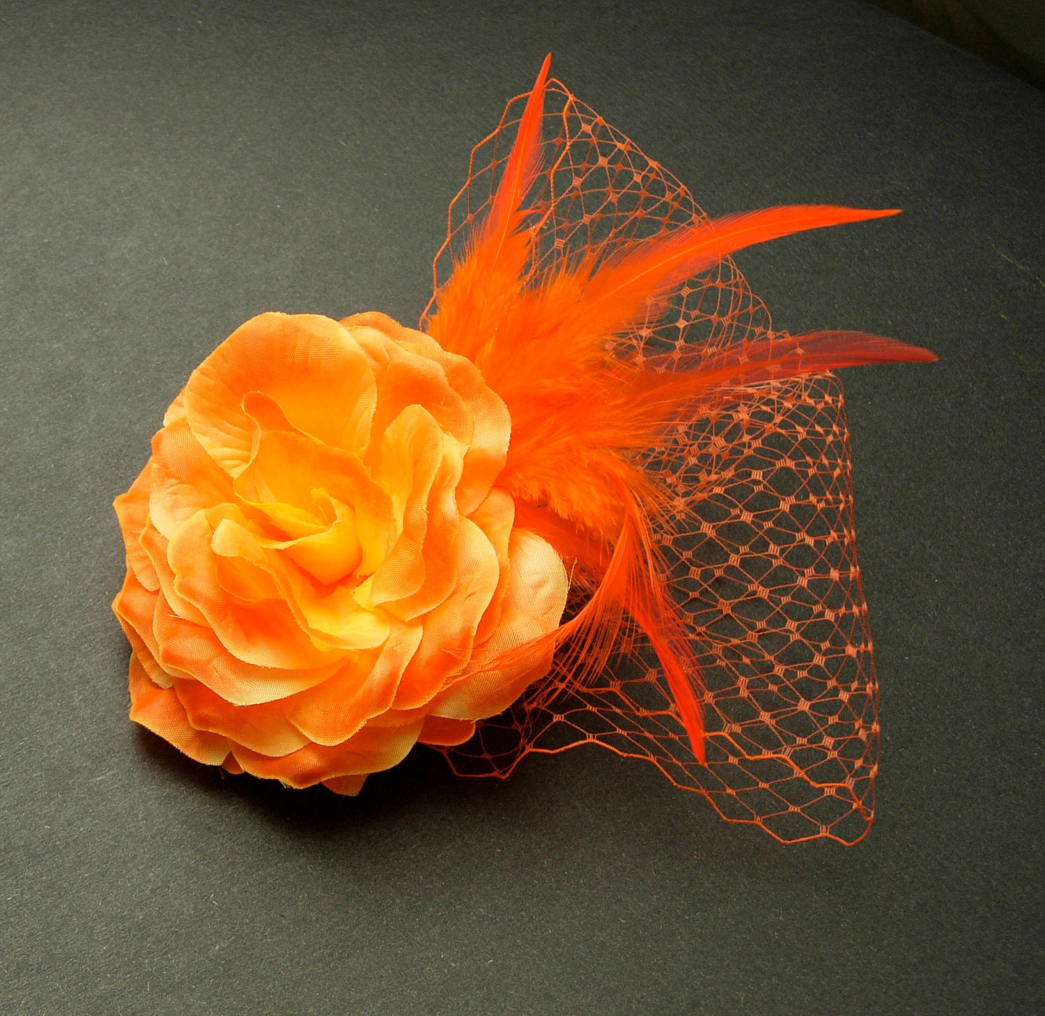 SALE - Bright yellow and orange flower and feather hair fascinator.