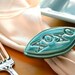 Set of Four Ready To Ship XOXO Napkin Rings by Symmetrical Pottery