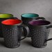 Spiky Coffee Mug: Made To Order Black and Orange Dangerously Spiky Coffee Mug by Symmetrical Pottery