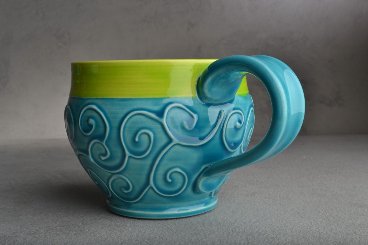 Curly Mug: Caribbean Blue and Neon Green Slip Trailed Mug by Symmetrical Pottery