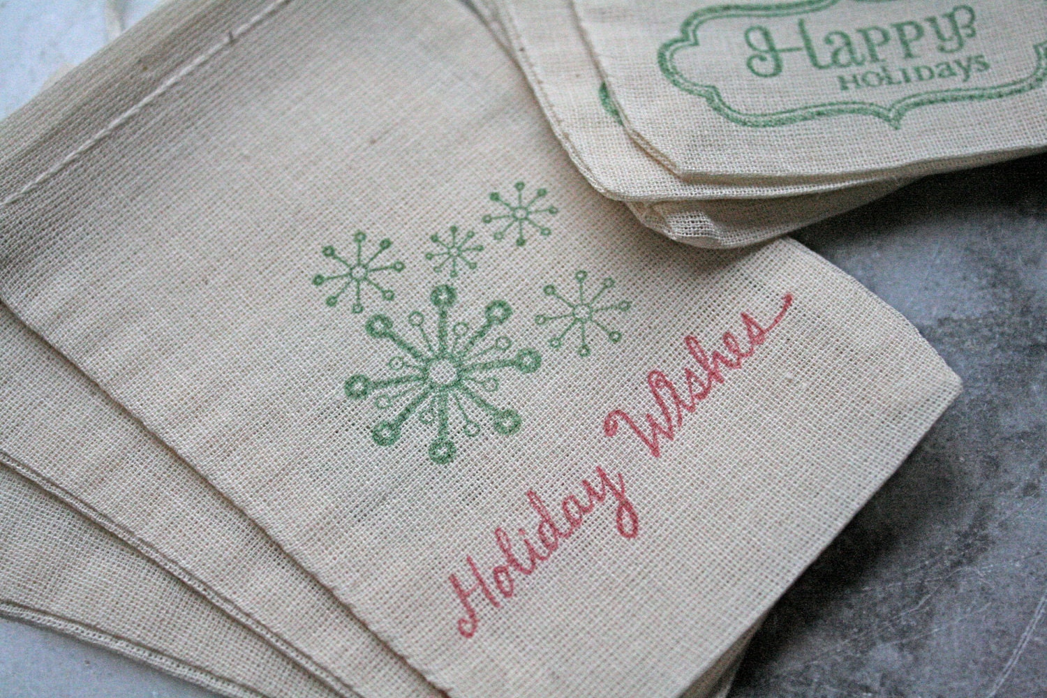Holiday party favor bags, Christmas gift bags, muslin, 3x5. Set of 10.  Happy Holidays snowflakes in red and green.  Great gift card holder.