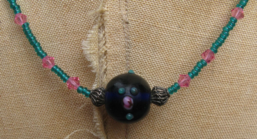 Everyday interesting: Green glass and pink crystal necklace.