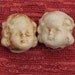 Antique Doll Heads Rusty Unglazed Porcelain