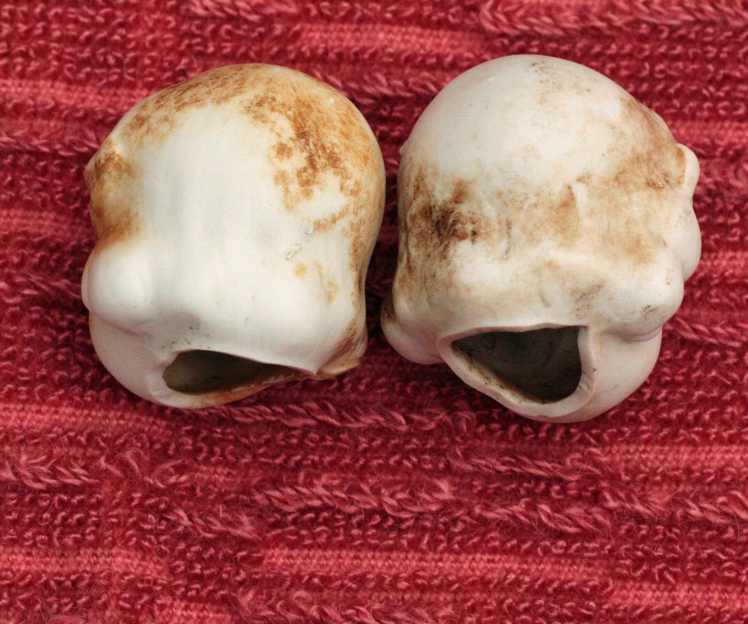Antique Doll Heads Rusty Unglazed Porcelain