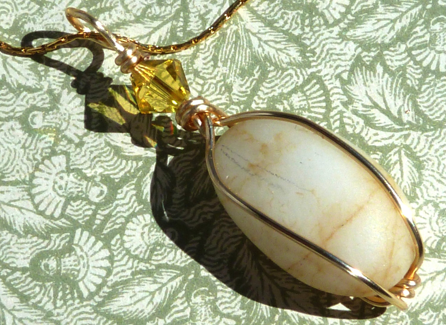 Sale 30% Off Wire wrapped necklace gold veined beach stone marble pebble with Swarovski crystal, gold plate necklace, beach wedding