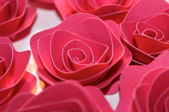 FUSCHIA rosette style paper flowers for weddings or embellishments - set of 100