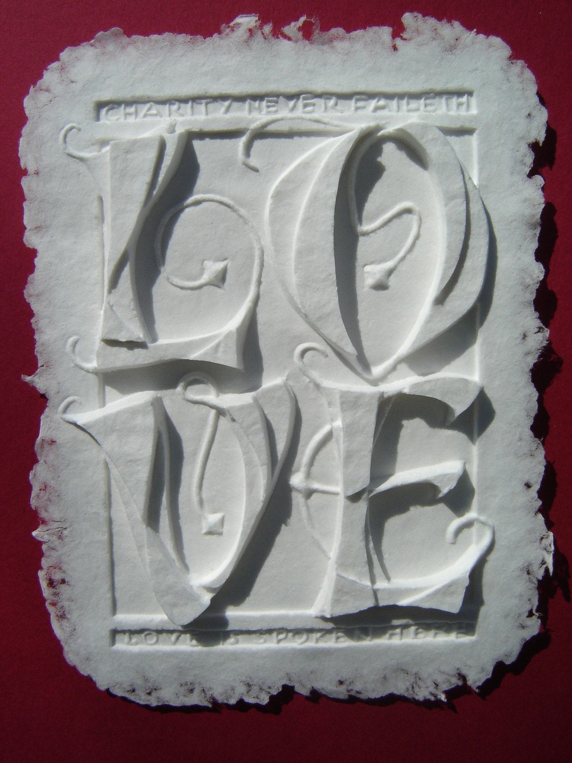Elegant Papercast LOVE matted to 8x10 inches on blue