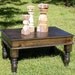 Ebony Coffee Table with Beautiful Hand Carved Legs and a hinged top that opens
