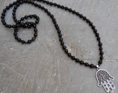 p r o t e c t i o n - hamsa ebony rosary