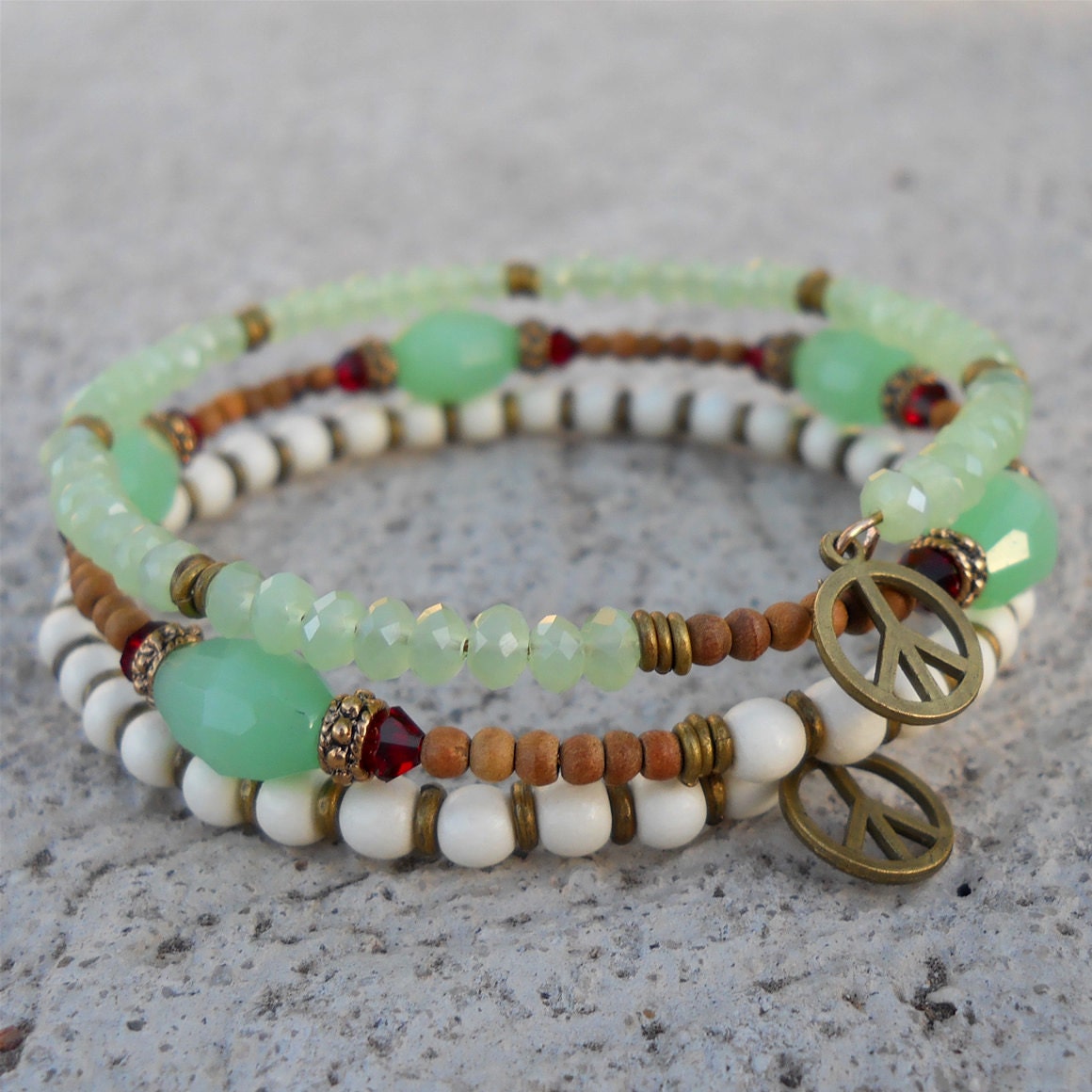 Boho chic - white wood, sandalwood, African trade beads, Swarovski crystal, peace signs beaded bangle