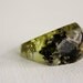 Lichen and moss eco resin ring with soft rectangular facets.