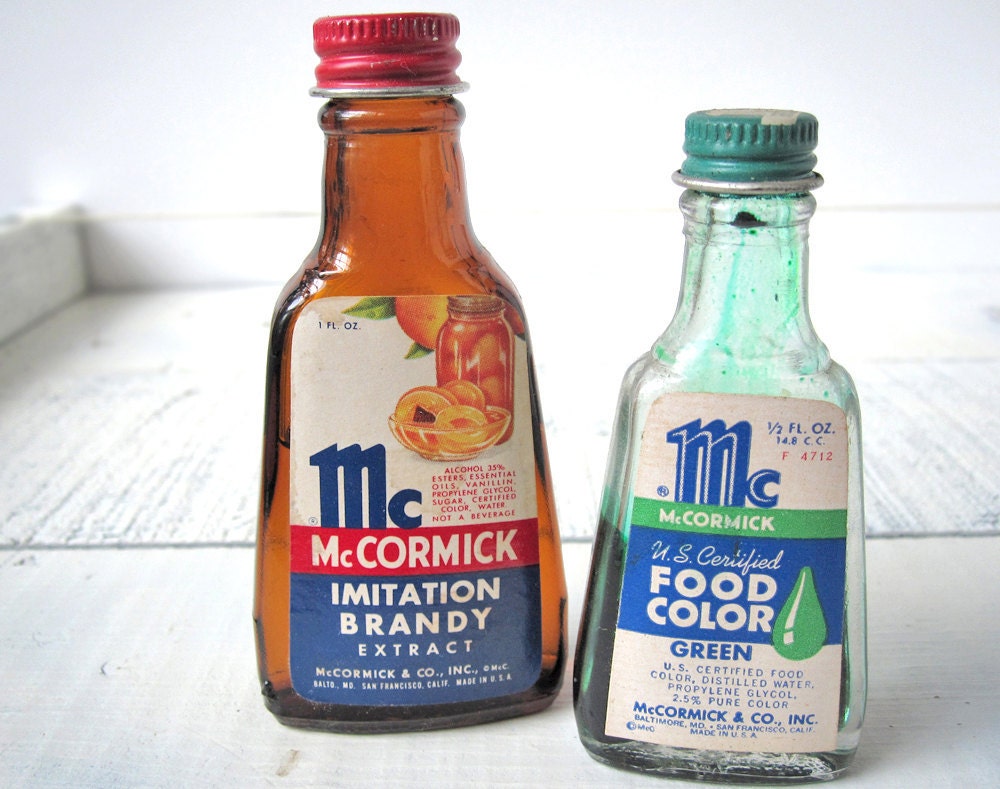 McCormick glass bottles, imitation brandy extract and green food coloring, vintage kitchen, art deco, set of two, green and red, peaches