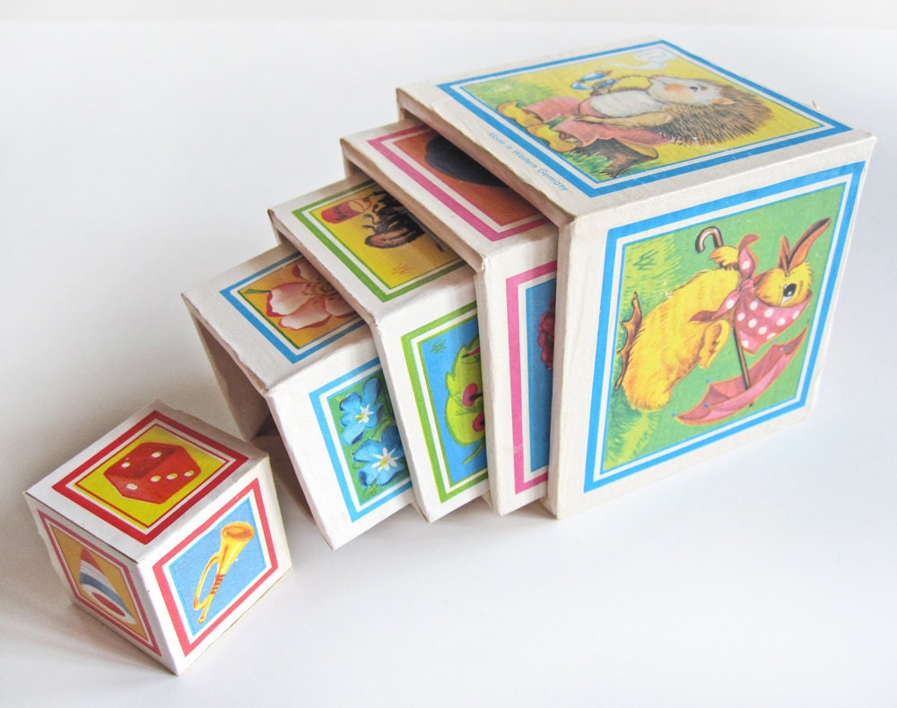 Children's toy nesting blocks, lithographed paper on wood, made in Western Germany, set of five stacking blocks