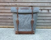 Waxed canvas rucksack/backpack with roll up top and waxed leather shoulderstrap,handle and leather bottem COLLECTION UNISEX