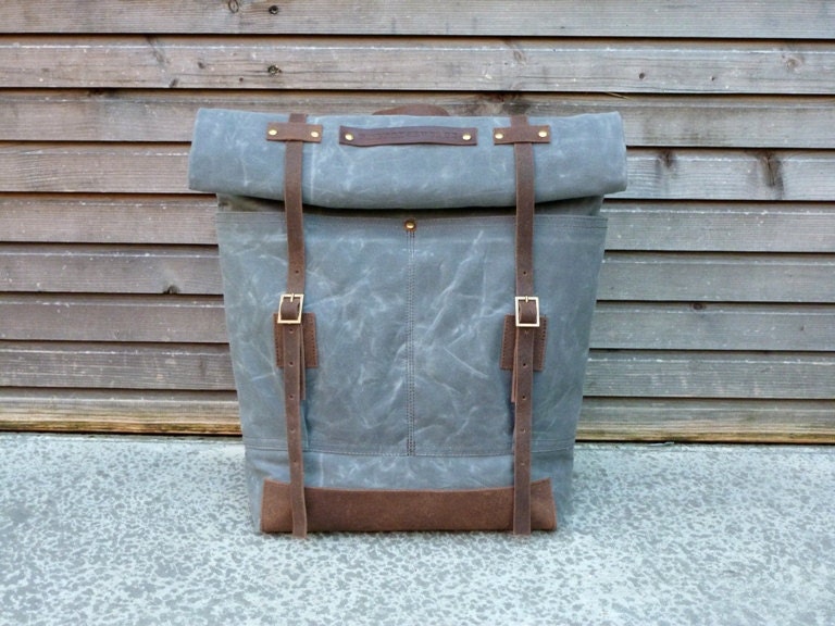 Waxed canvas rucksack/backpack with roll up top and waxed leather shoulderstrap,handle and leather bottem COLLECTION UNISEX