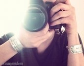 A Photograph is a Secret about a secret. The more it tells you the less you know. (bracelet)