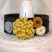 Leather cuff bracelet with felt flower bouquet