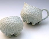 Pale blue & white carved porcelain creamer and sugar bowl set