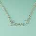 Custom necklaces with a word and a tiny heart. Custom wire word jewelry. Personalize this necklace with any word up to 8 letters.