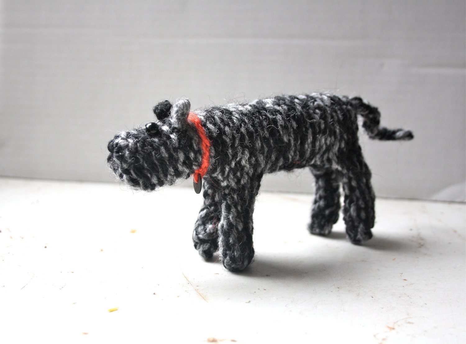 Small hand knitted dog