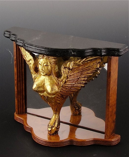 Dollhouse Console, Herra