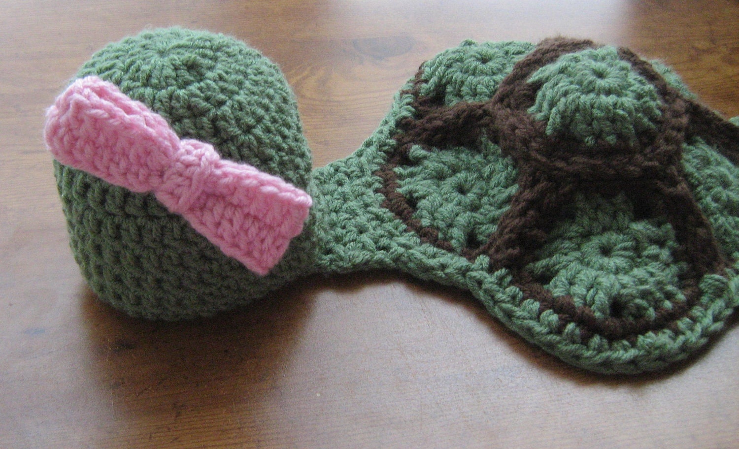 Turtle hat and Cuddle Critter Cape or add a bow for 3.00