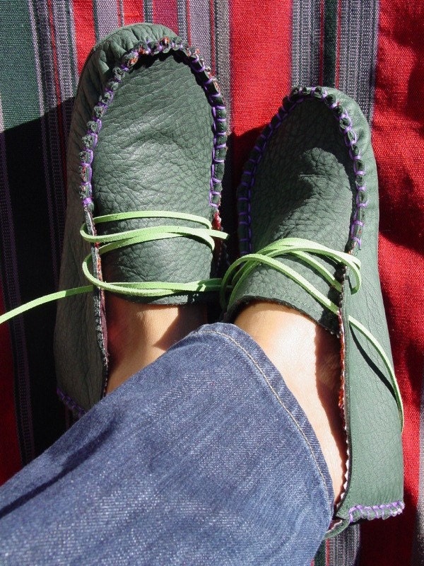 green leather moccasins