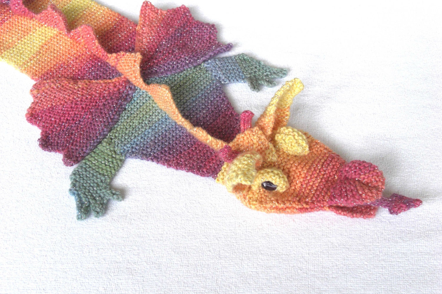 Hand Knitted Childs Magical Dragon Rainbow Scarf , made to order by scunjeebabe