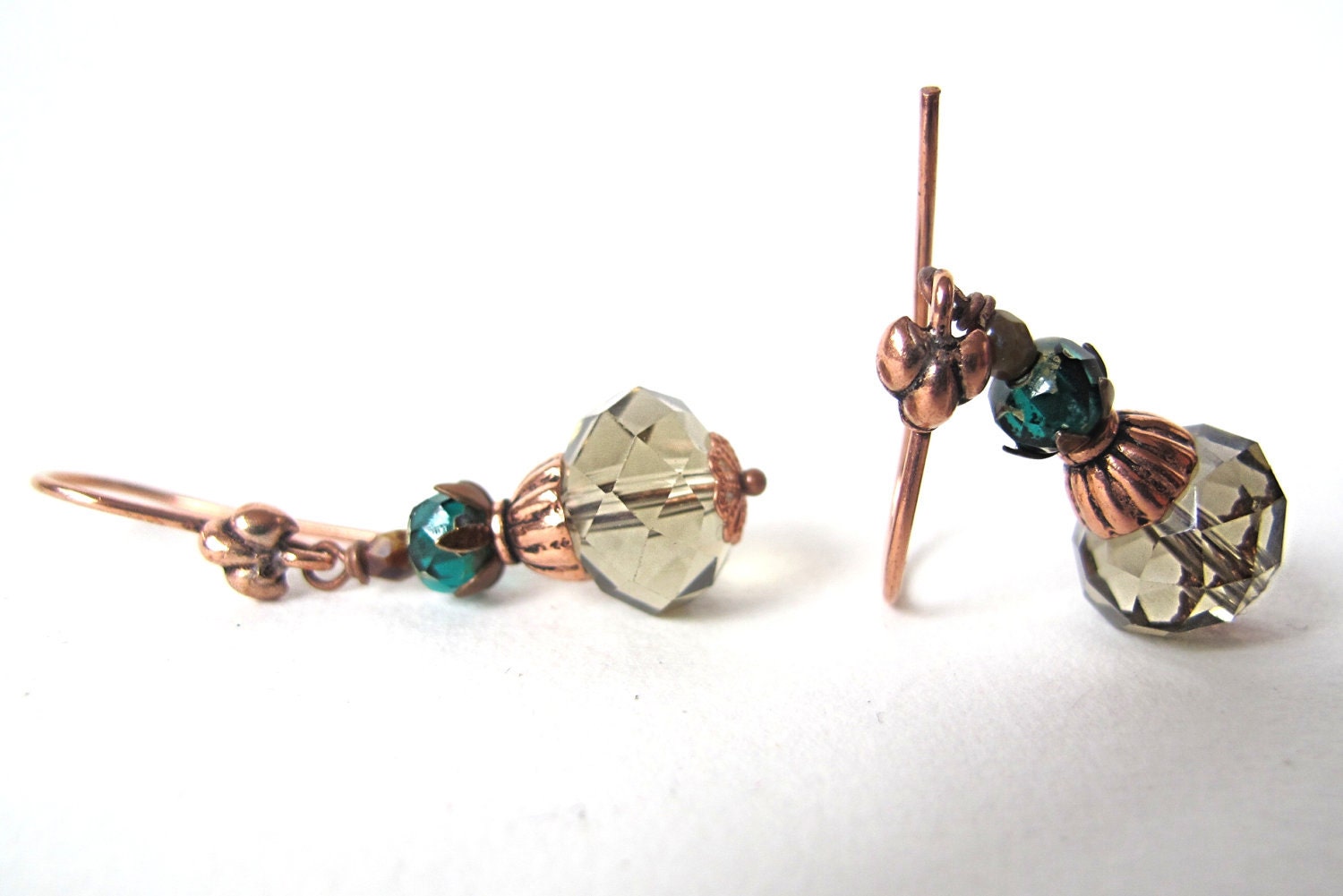 shiny glass beads in green-blue and a sort of grey with copper