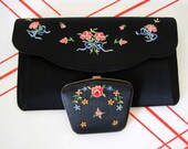 Black satin embroidered clutch and matching compact