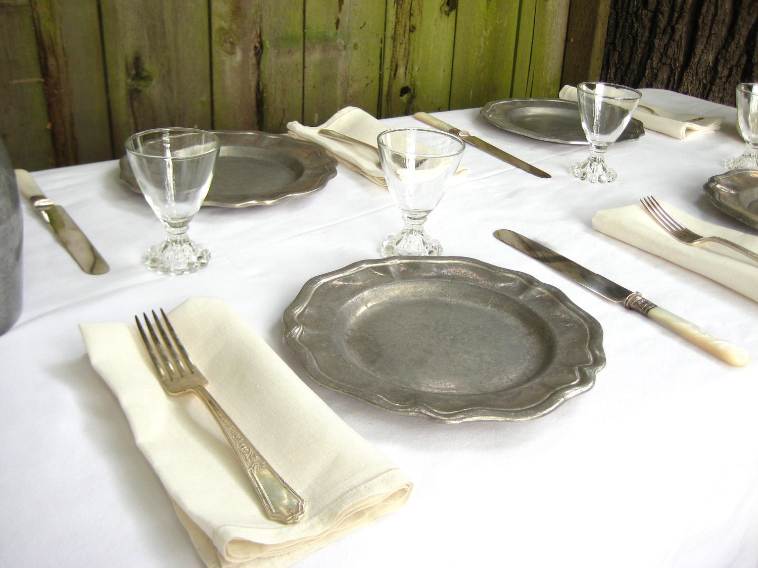 Set of Seven Pewter Plates