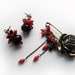 Desert rose pin brooch,kilt pin,with red corals,swarovski crystals,black jade beads