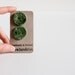 handmade ceramic buttons. dotted, medium, round, bottle green. unique handcrafted needlecraft supplies. set of 2.