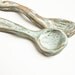 rustic green stoneware spoons, set of two handshaped ceramic spoons, perfect for spooning sugar or salt from your favourite bowl