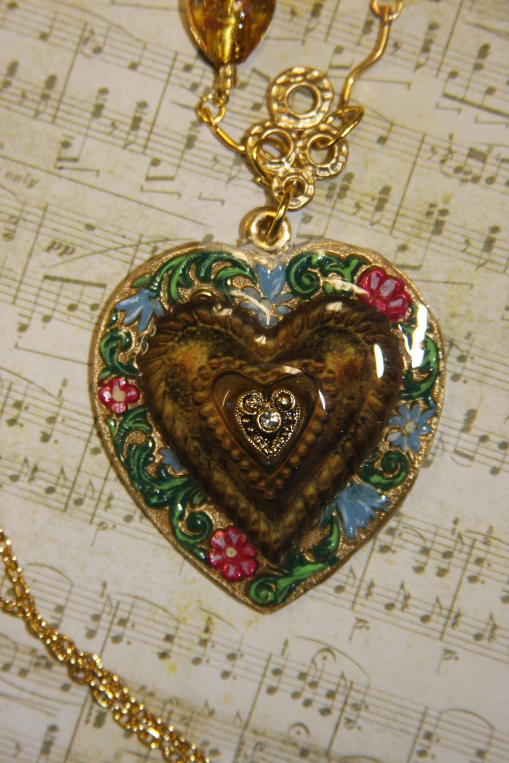 Steampunk metal heart hand painted glass heart beads amber color