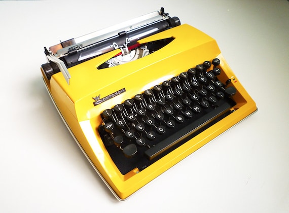 Vintage Contessa DeLuxe Yellow Typewriter Portable Manual Triumph Adler