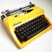 Vintage Contessa DeLuxe Yellow Typewriter Portable Manual Triumph Adler