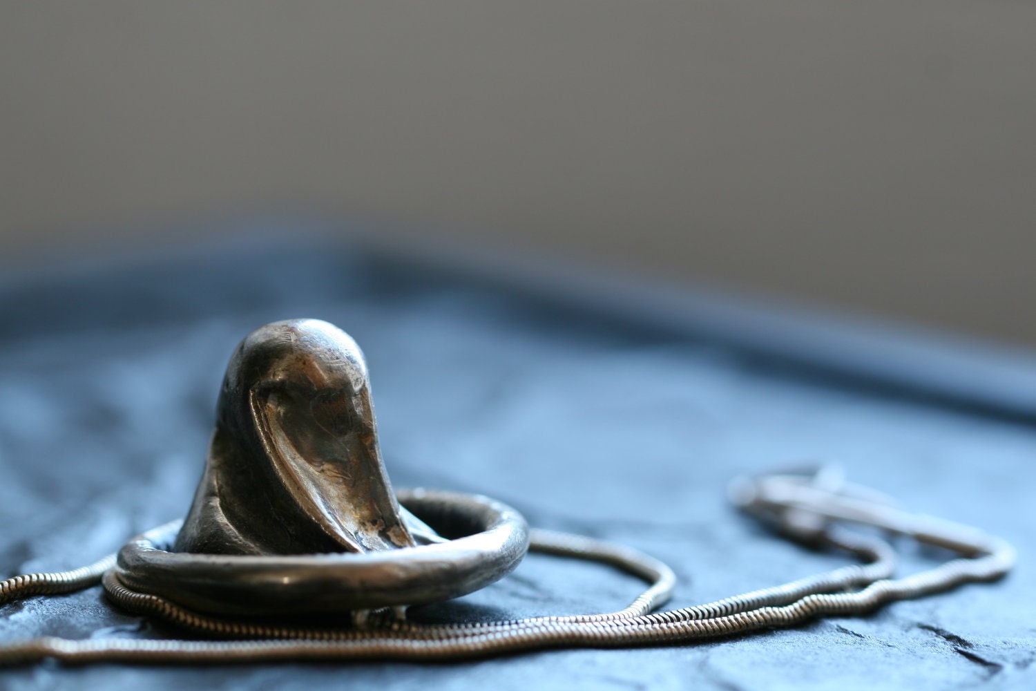 sterling silver condom necklace cast silver pendant