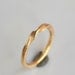A Simple Twist 18k gold stacking ring