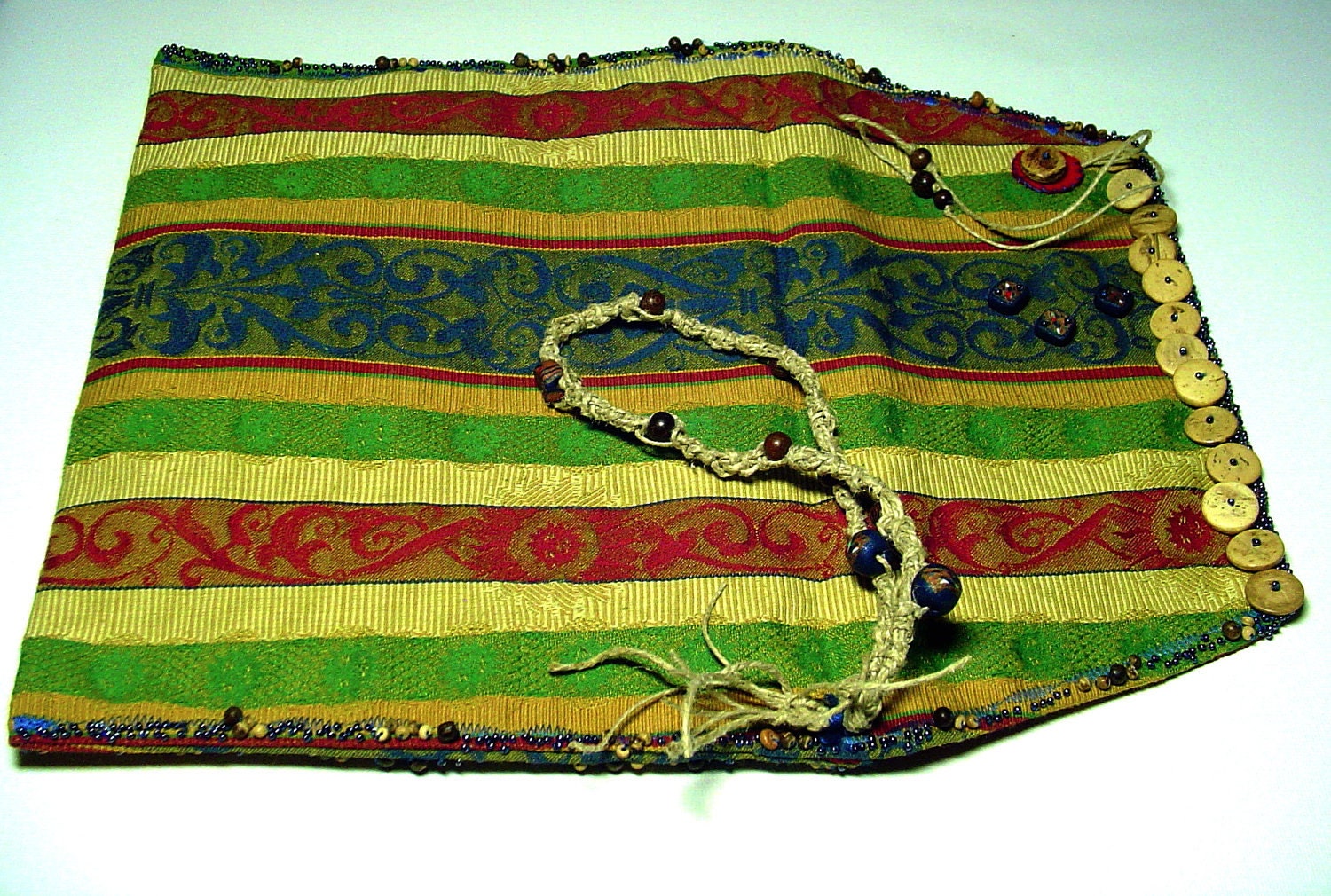Beaded clutch purse. multi colored jacquard fabric purse.