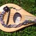 Macrame hemp bracelet. blue sea glass beaded bracelet with sugar skull, rose quartz and black velvet flower