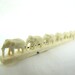 1930s Pre-Ban Ivory Elephants In-A-Row Pin