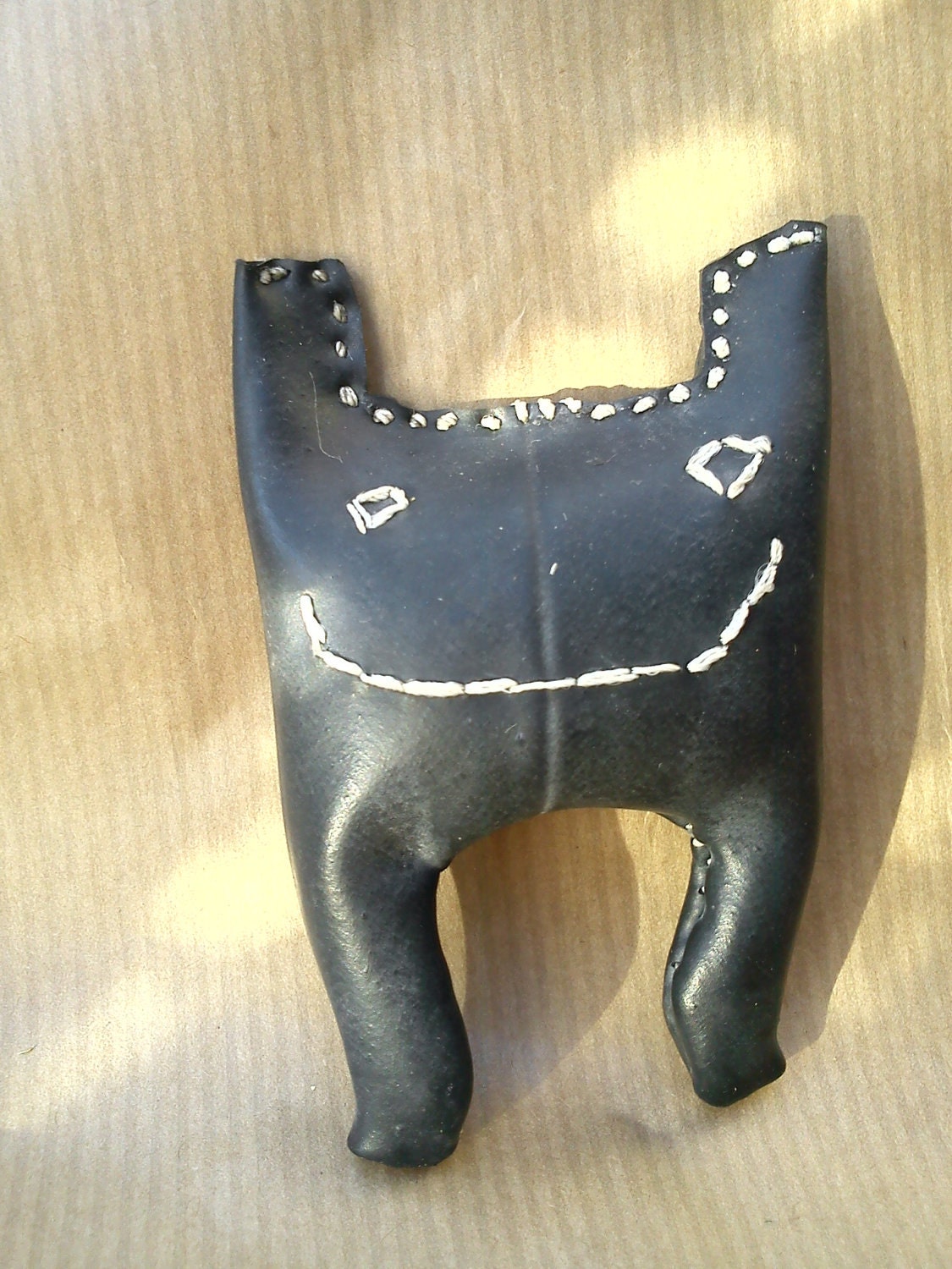 Max - Little creature made from a recycled bicycle inner tube.