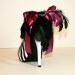 Zebra peeptoe pump with satin bow and feathers