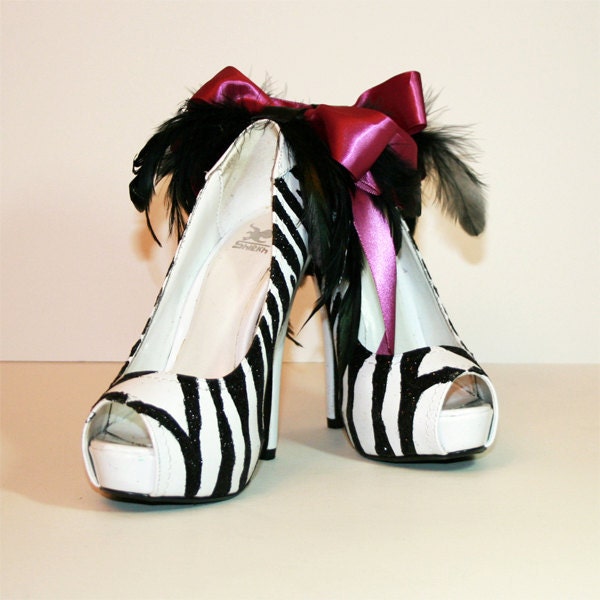 Zebra peeptoe pump with satin bow and feathers