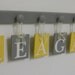 Grey and Yellow Wall Letters Custom Name Sets includes 6 Wooden Hooks for Baby REAGAN