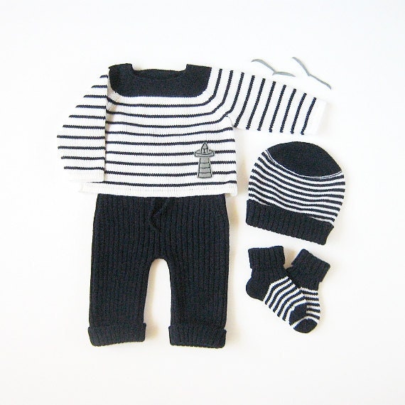 Knitted sweater, ribbed pants, hat and socks set in navy and of white for a baby boy. Newborn. 100% wool.