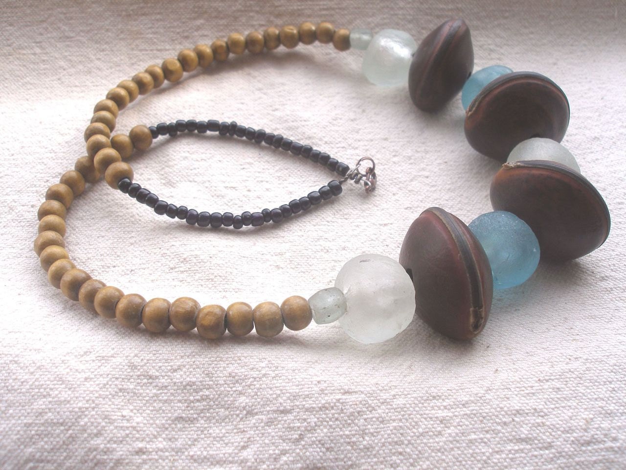 African Blue and  white clear recycled glass Mucuna seed  wood necklace by Fianaturals