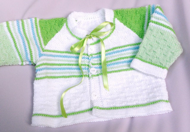 Hand knitted baby cardigan in white, green and blue