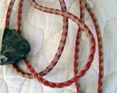Vintage 60's Bolo Tie Gray Marbleized Stone in Diamond Pattern Red and Tan Braided Leatherette  Cord